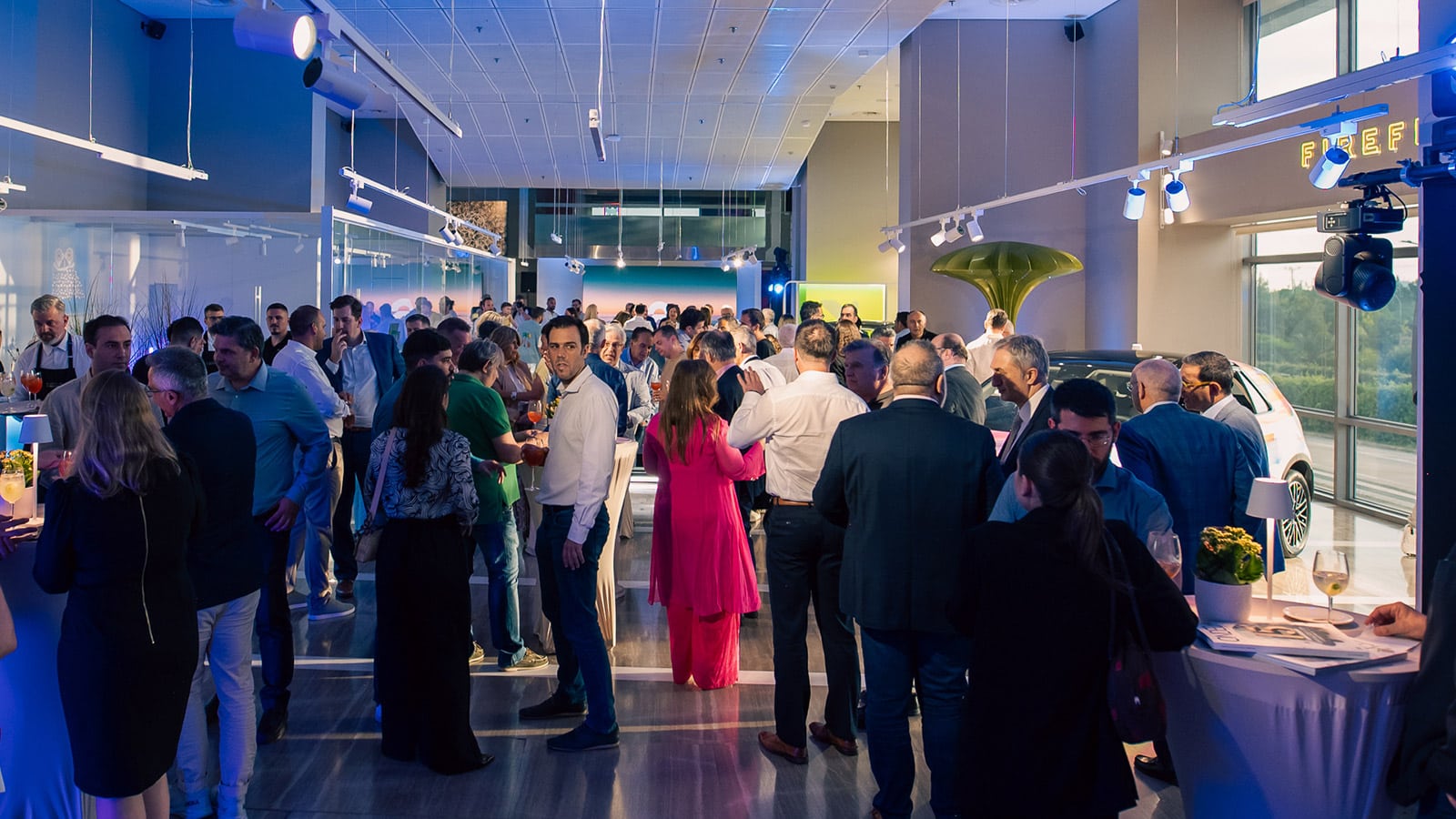 People gathered at the opening ceremony of Nio's first store in Greece — Nio House Athens.