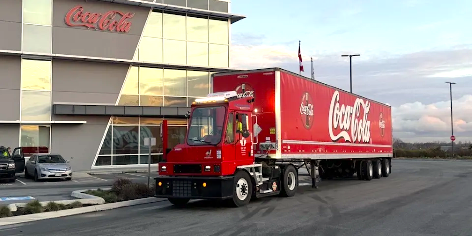 Orange EV delivers 2,000th electric terminal truck to Coke Canada Bottling