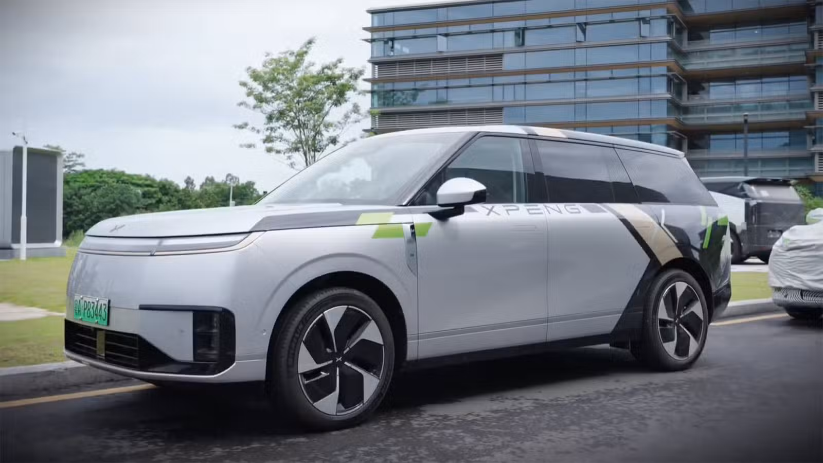 A screenshot from a video shows an Xpeng robotaxi arriving at the Xpeng headquarters in Guangzhou.