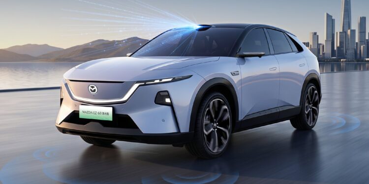 Mazda пуска на пазара в Китай обновения модел EZ-60 и добавя версии с LiDAR, за да запълни празнината в областта на интелигентното шофиране 1 Front three-quarter view of a white Mazda EZ-60 LiDAR variant with a roof-mounted LiDAR sensor emitting blue light beams, parked on a waterfront road with mountains and a city skyline in the background. Blue rings on the ground illustrate the vehicle's sensor coverage.