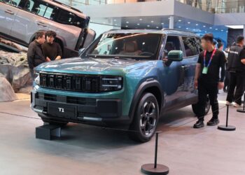 A green Chery Jetour T1 SUV on display at the Beijing auto show in April 2026.
